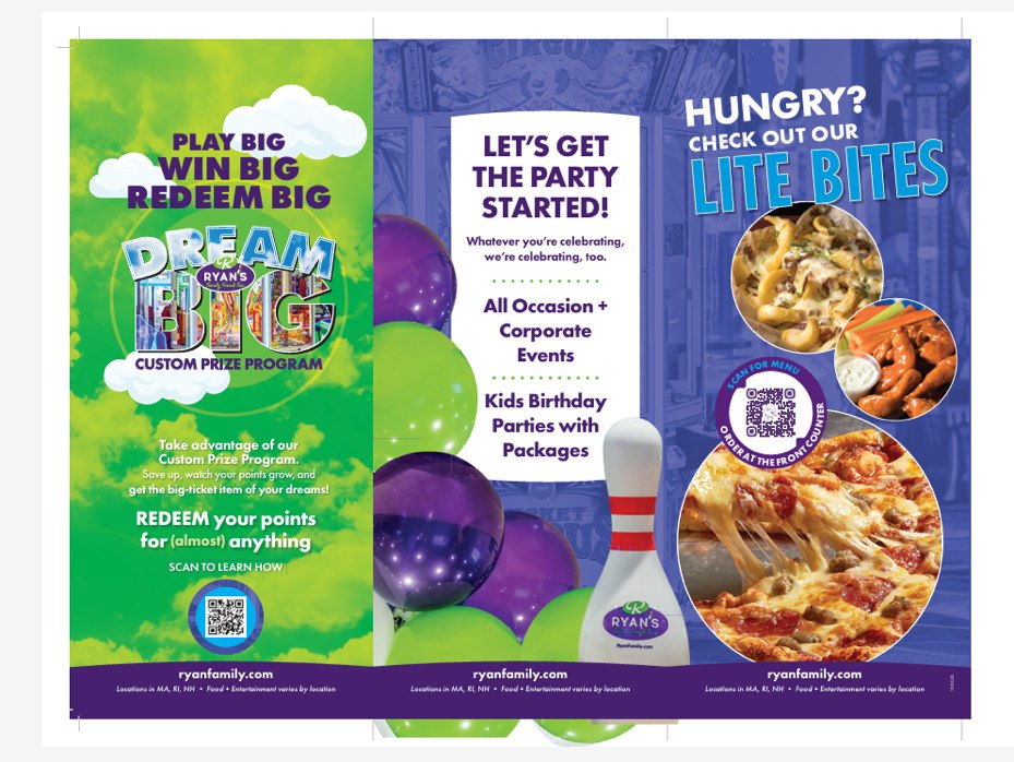 Three-sided table tent with panels for Dream Big prizes, party bookings, and Lite Bites food.